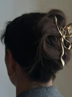 PICO COPENHAGEN Metallic Bow Claw (guld/sølv)